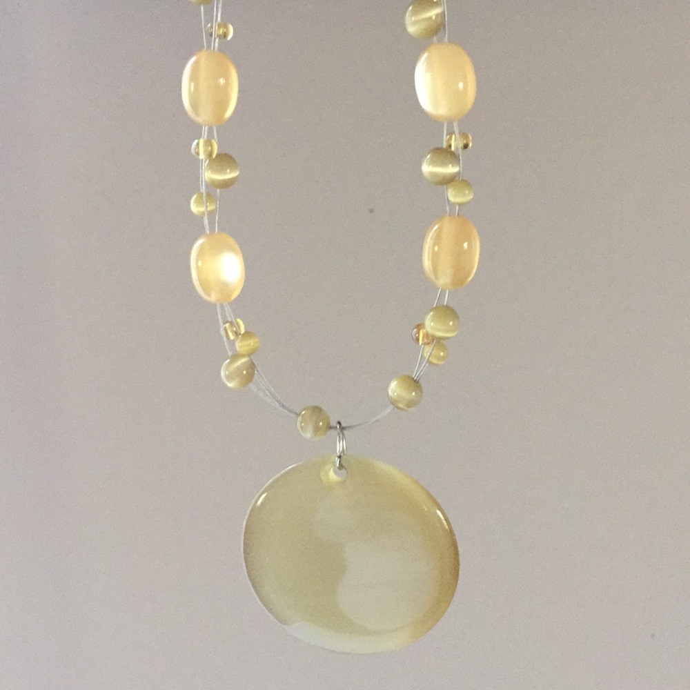Golden pendant necklace